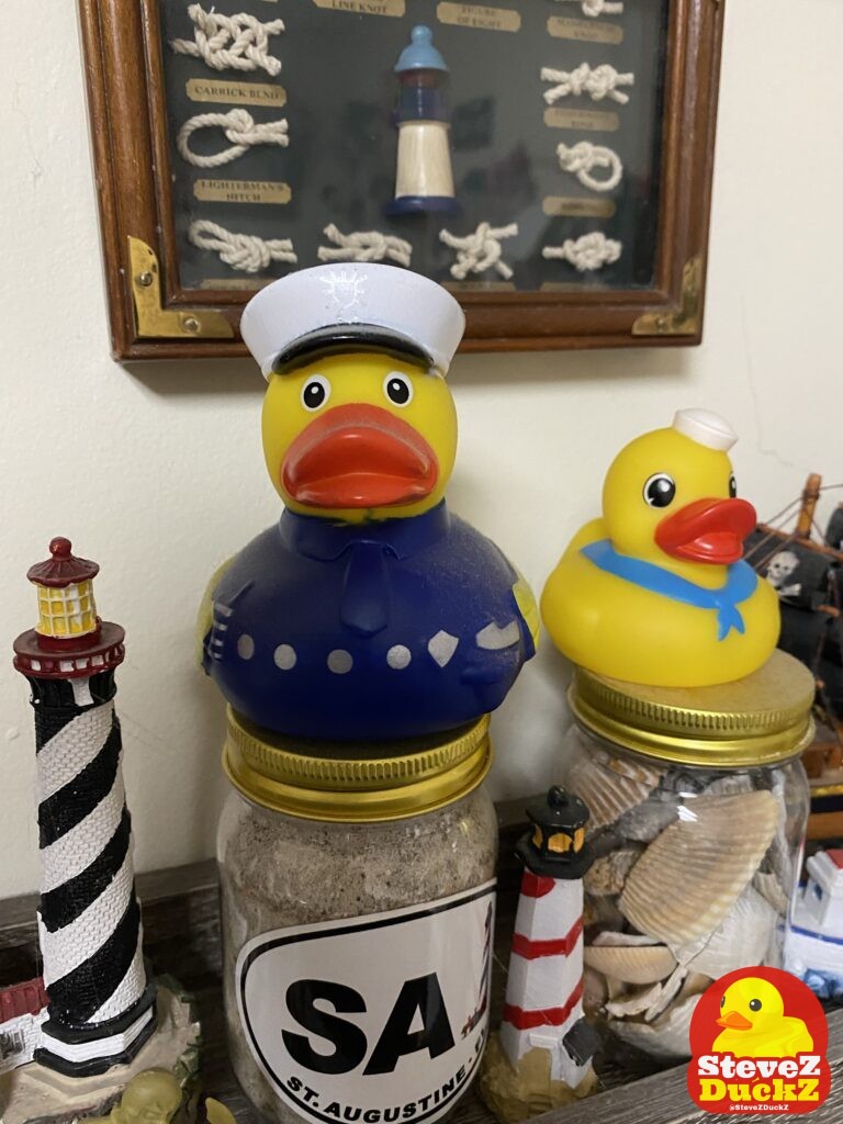 Admiral Quack (rubber duck in the left) and Duckmaster (rubber duck on the right). Admiral Quack is the rubber duck aboard another ship he is seen with his quartermaster, the one over ​all of their equipment, food and items aboard their ship.  